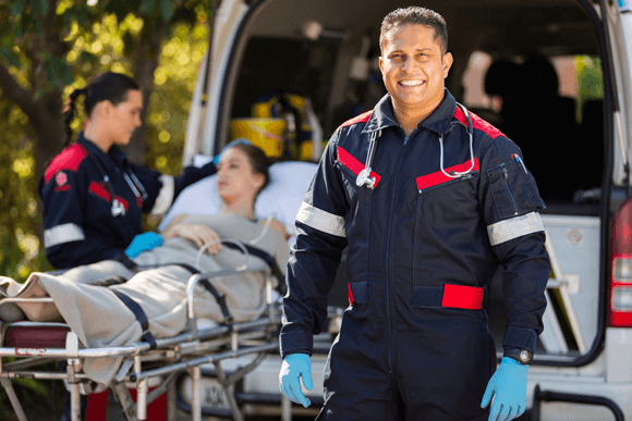 Long-distance medical transport vehicle and crew preparing for interstate service